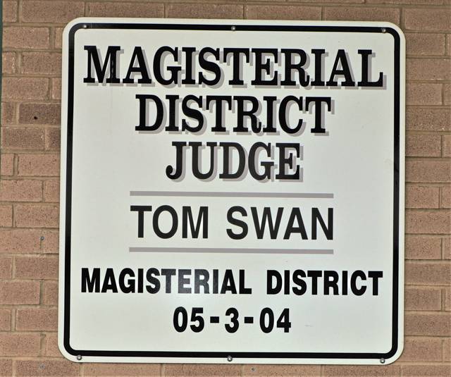 2887293_web1_WEB-district-judge-tom-swan-office-sign