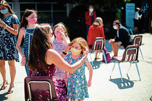 School districts tweak reopening plans again to require full-time mask use