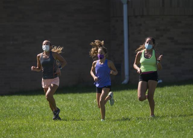 Cross country coaches make tweaks to run meets, generate ‘enthusiasm, optimism’