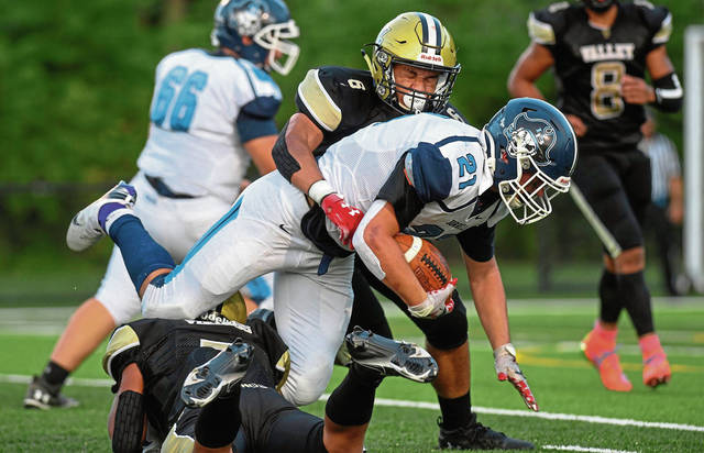 Burrell turns to ground game to hold off rival Valley