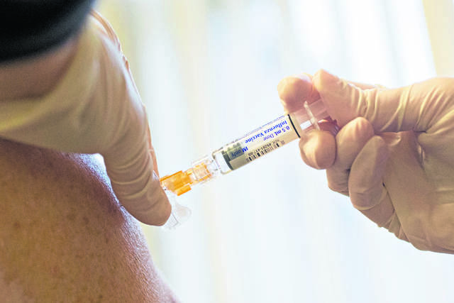 3073576_web1_flu-vaccine-1a93e7f8-cb2f-11e8-a360-85875bac0b1f