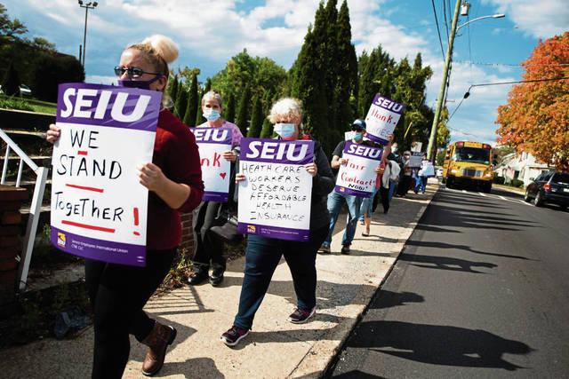 3079382_web1_gtr-HarmonPicket-1-100220