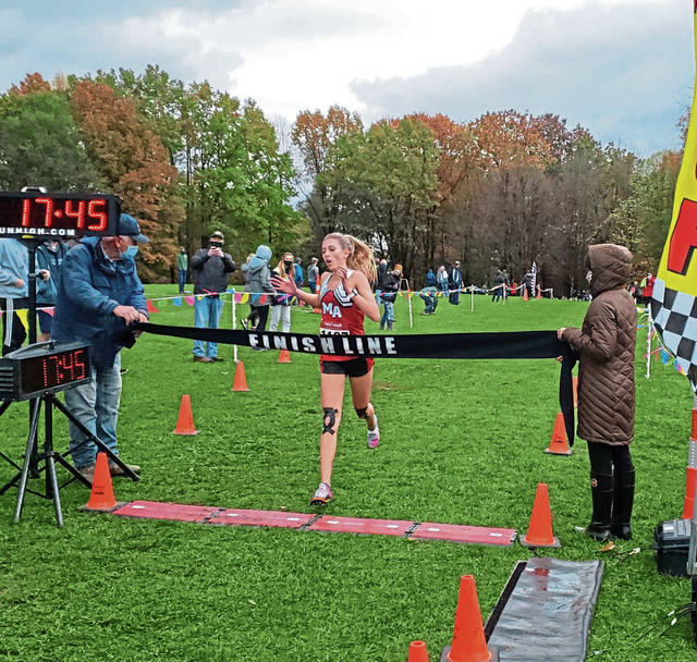 After last-minute test result, Moon’s Mia Cochran defends WPIAL Class AAA cross country title<span class="headline-video">Video <i class="fa-solid fa-circle-play"></i></span>