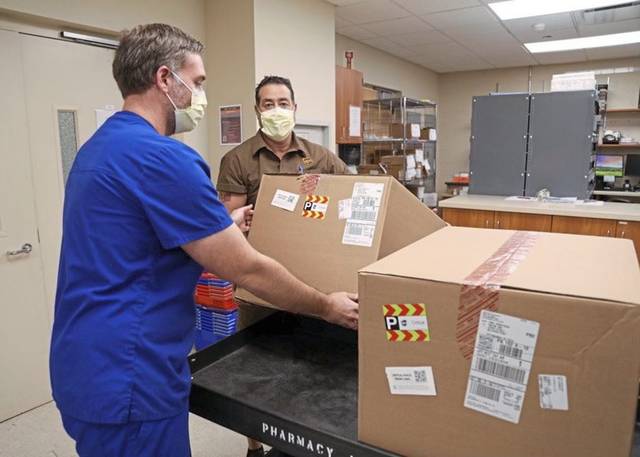3320136_web1_ptr-vaccineprep1-121220
