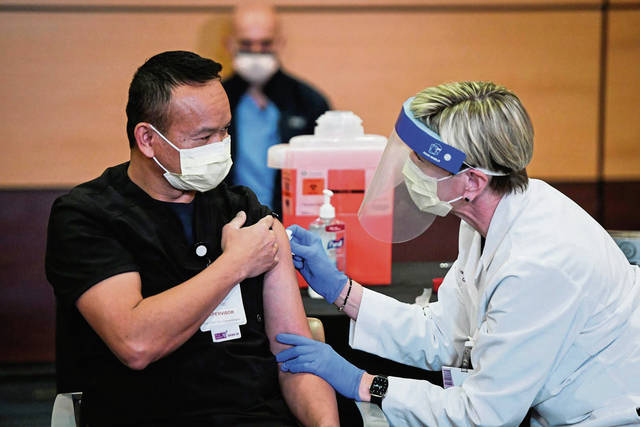 3330918_web1_ptr-vaccine009-121520