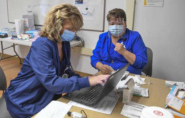 3343964_web1_VND-AVHCovidShots2-121920