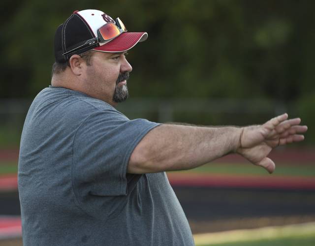 Waynesburg community mourns death of football coach Chad Coss