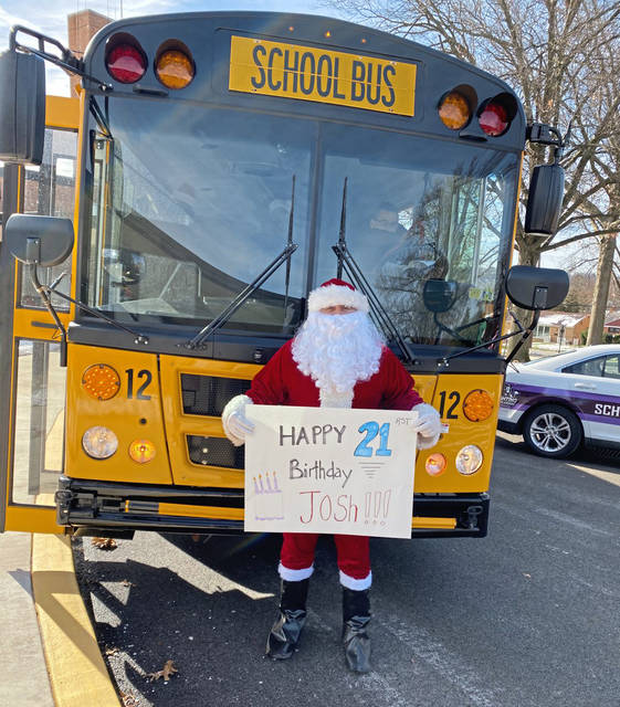 3380223_web1_shr-santabus1a-123120