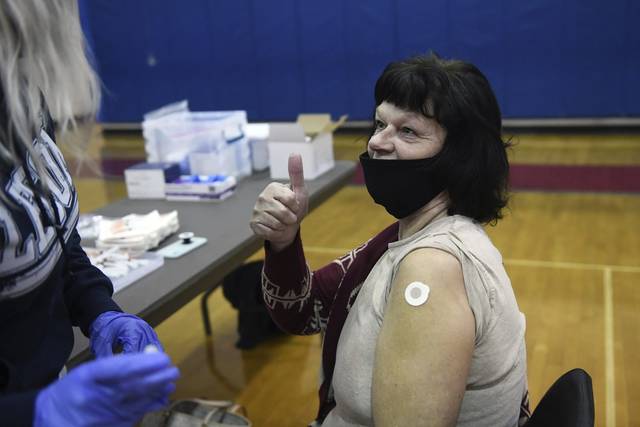 3507742_web1_sig-CVvaccine005-021821