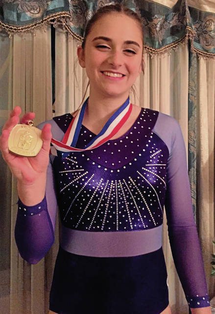 Experience helps Plum’s Kvortek capture WPIAL gymnastics gold medal in bars event