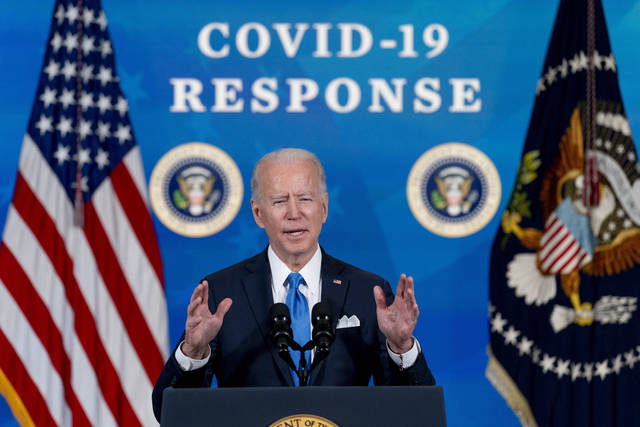 Biden signs $1.9T relief bill before speech to nation