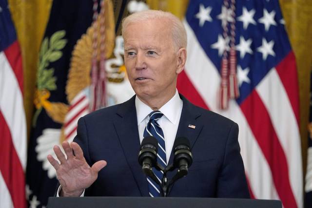 3675325_web1_ptr-bidenpressconference-032621