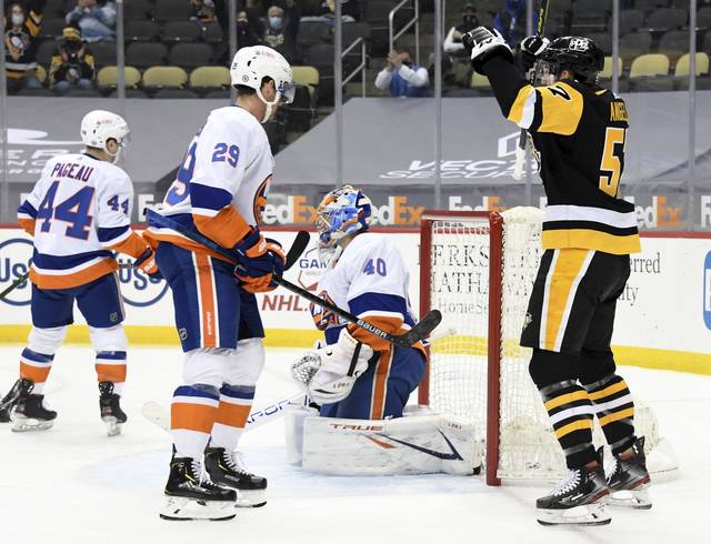 3687733_web1_ptr-Pens-Islanders01-033021