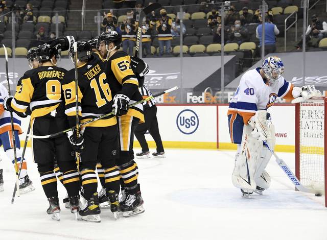 3687733_web1_ptr-Pens-Islanders02-033021
