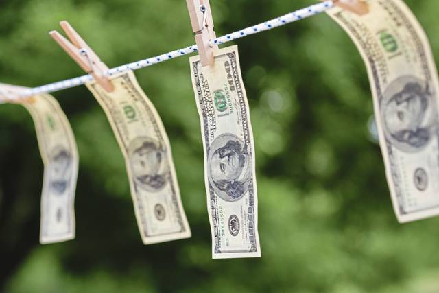 3851107_web1_web-MoneyLaunder