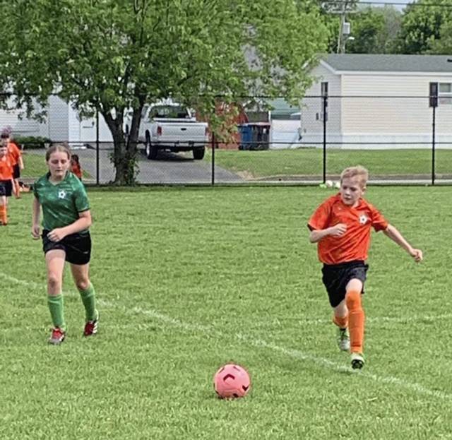 3911329_web1_gtr-LatSoccerKids-060321