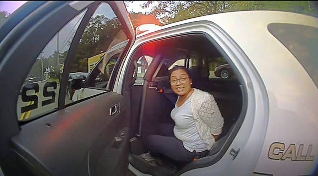 4039168_web1_Sharena-Nancy-in-police-car