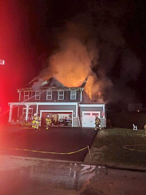 Chief: Spark from fire pit caused Penn Township house fire