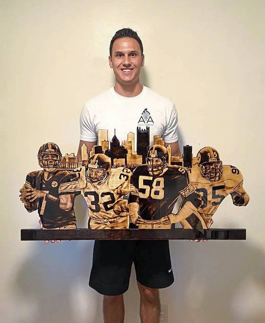 Plum native has burning desire to make sports-themed art