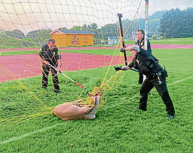 4182515_web1_gtr-Gbgcopssoccer-crop1