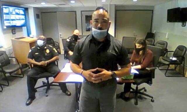 4205522_web1_Garcia-at-meeting