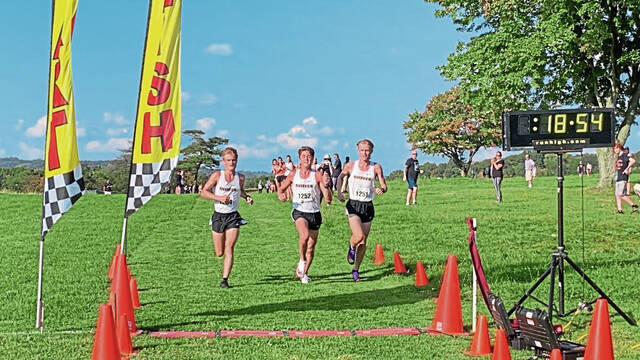 Riverview boys cross country team celebrates 4th straight section title
