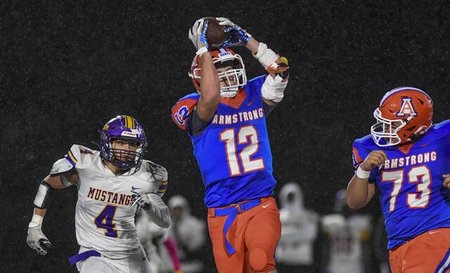 Olsen, Armstrong run wild, hold off Plum