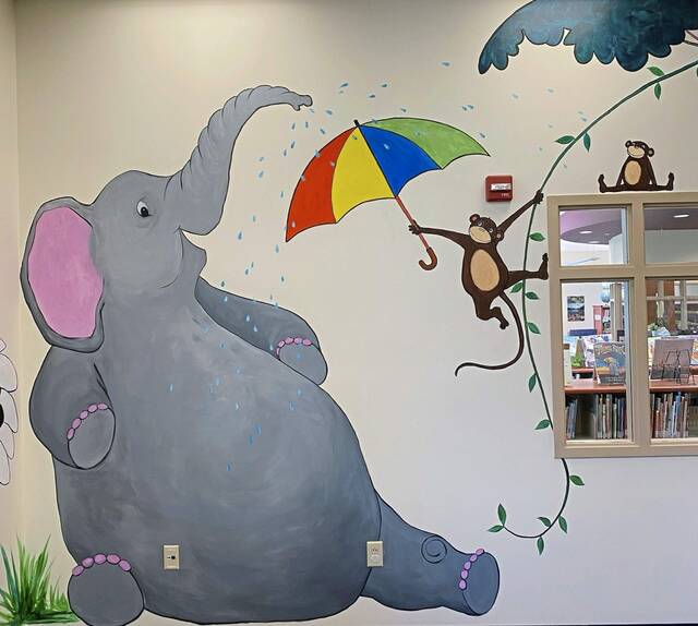4504822_web1_her-librarymural-120921
