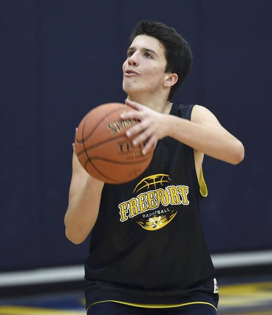 Freeport boys basketball cleans glass, beats rival Springdale