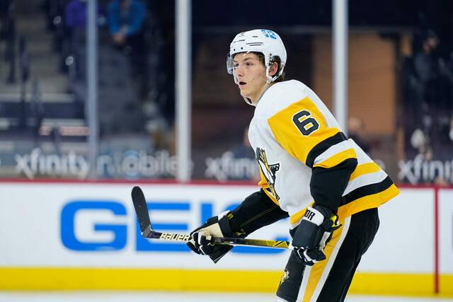 John Marino of the New Jersey Devils gets ready during a face off