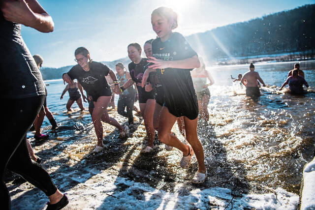 Hardy souls shrug off frigid temperature for polar plunge in Derry Township