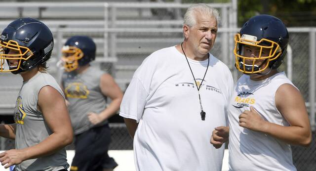 Mars school board set to open job of football coach Scott Heinauer