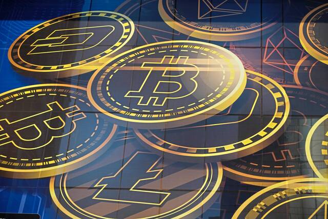 4660099_web1_ptr-bitcoin-122921