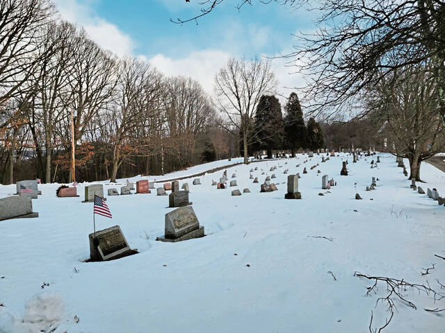 4669656_web1_vnd-dedicatedcemeteryworker-0125213