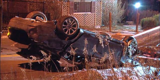 4739272_web1_ptr-FlippedCar-021122