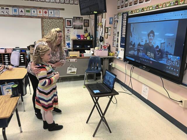 4836080_web1_Kindergarten-teacher-Nicole-Cole-with-Emma-Sartori
