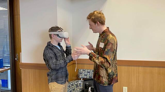 4864895_web1_CMU-student-Matthew-Komar,-right