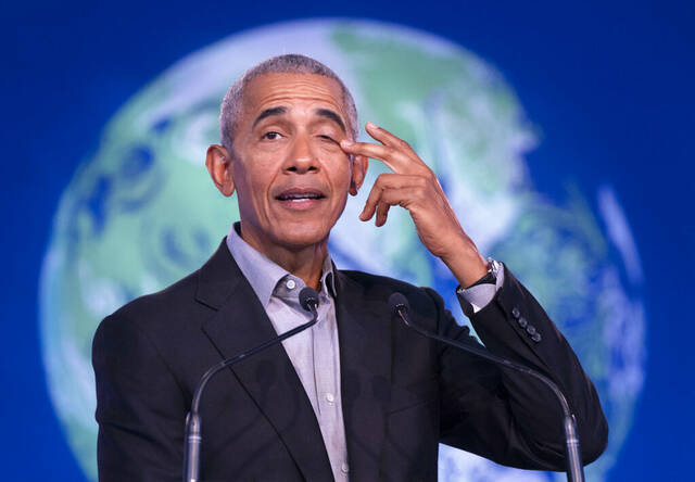 Obama, back at White House with Biden, celebrates his signature health care law’s anniversary