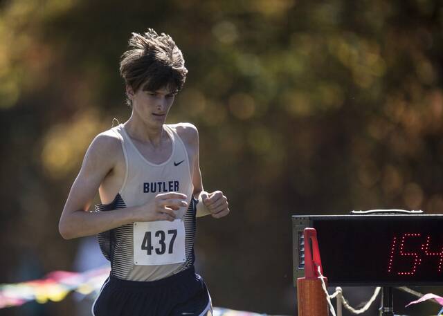 CJ Singleton shatters meet record in 3,200 as home team dominates Butler Invitational