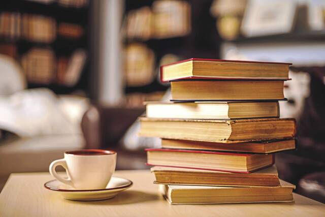 4988971_web1_Book-Pile2
