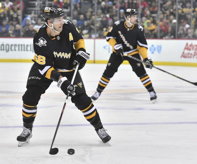 Crosby, Malkin score as Penguins beat Blackhawks 5-3, Taiwan News