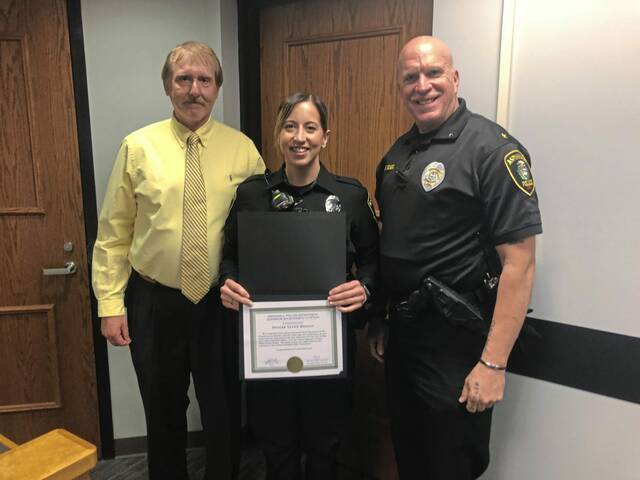 5018514_web1_HER-AspinwallOfficer-051222