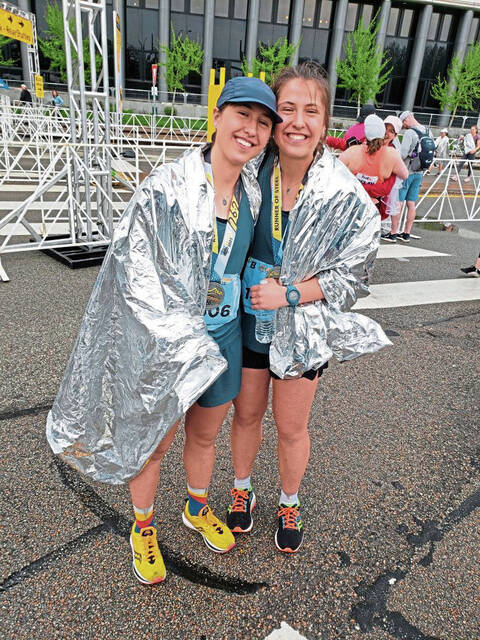 Running to honor their father’s memory, Latrobe twins finish among leaders at Pittsburgh Marathon