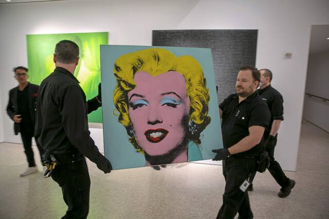 Andy Warhol’s ‘Marilyn’ silkscreen artwork sells for $195 million, most ever for U.S. artist