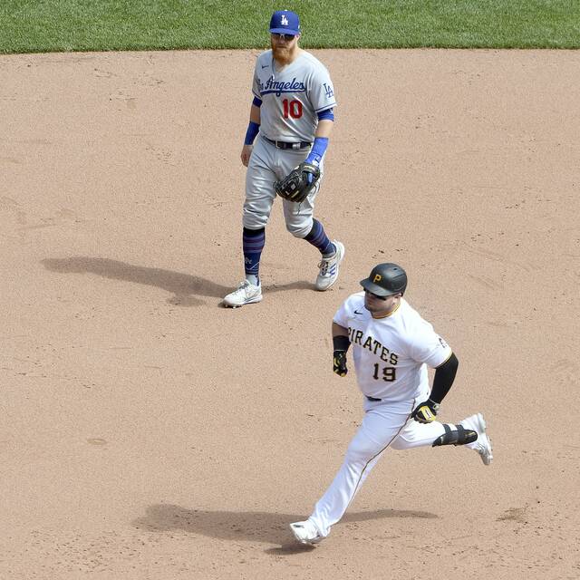 5038713_web1_ptr-BucsDodgers09-051222