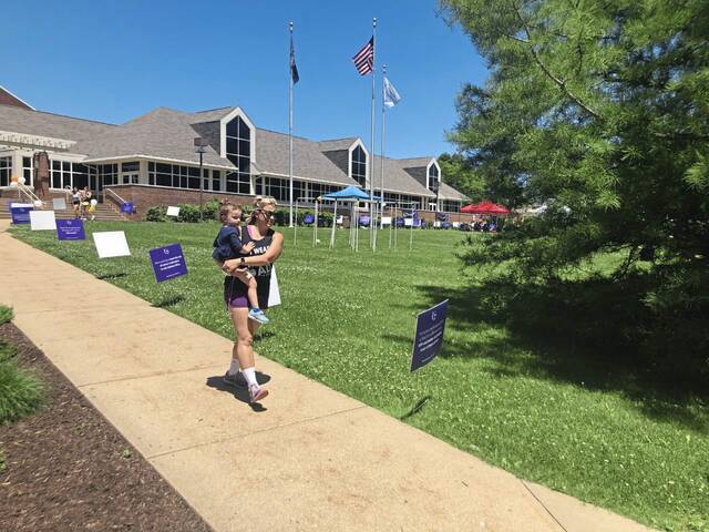 5113848_web1_Cancer-Relay-Carly-Bishop-holding-Molly-Casteel