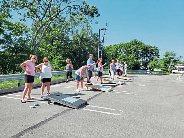 5179968_web1_naj-lo-cornhole-063022