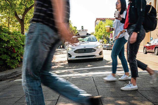 5224310_web1_BIZ-AUTO-SELFDRIVING-CITIES-MCT