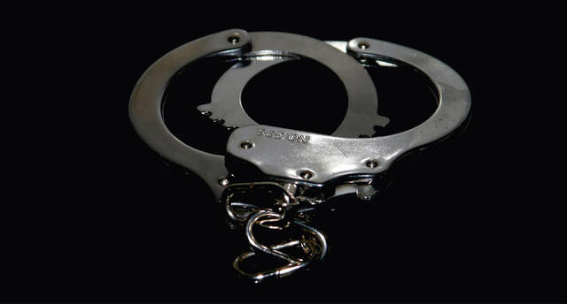 5238707_web1_web-handcuffs_dark