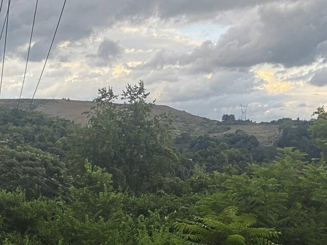5304826_web1_Mountain-of-covered-garbage-at-Sanitary-Landfill